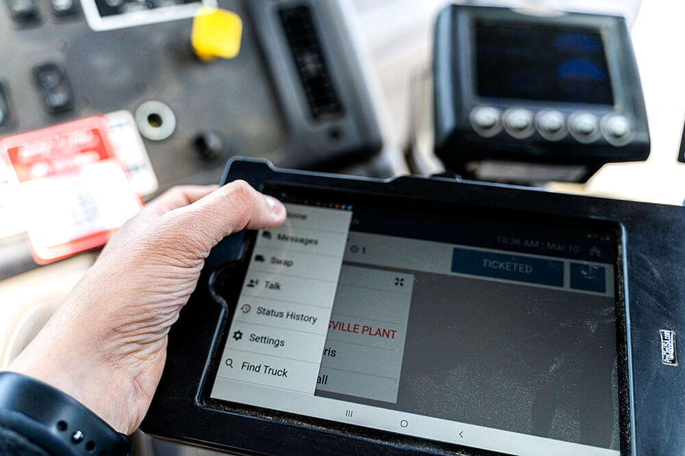 trackit1 man holding trackit tablet